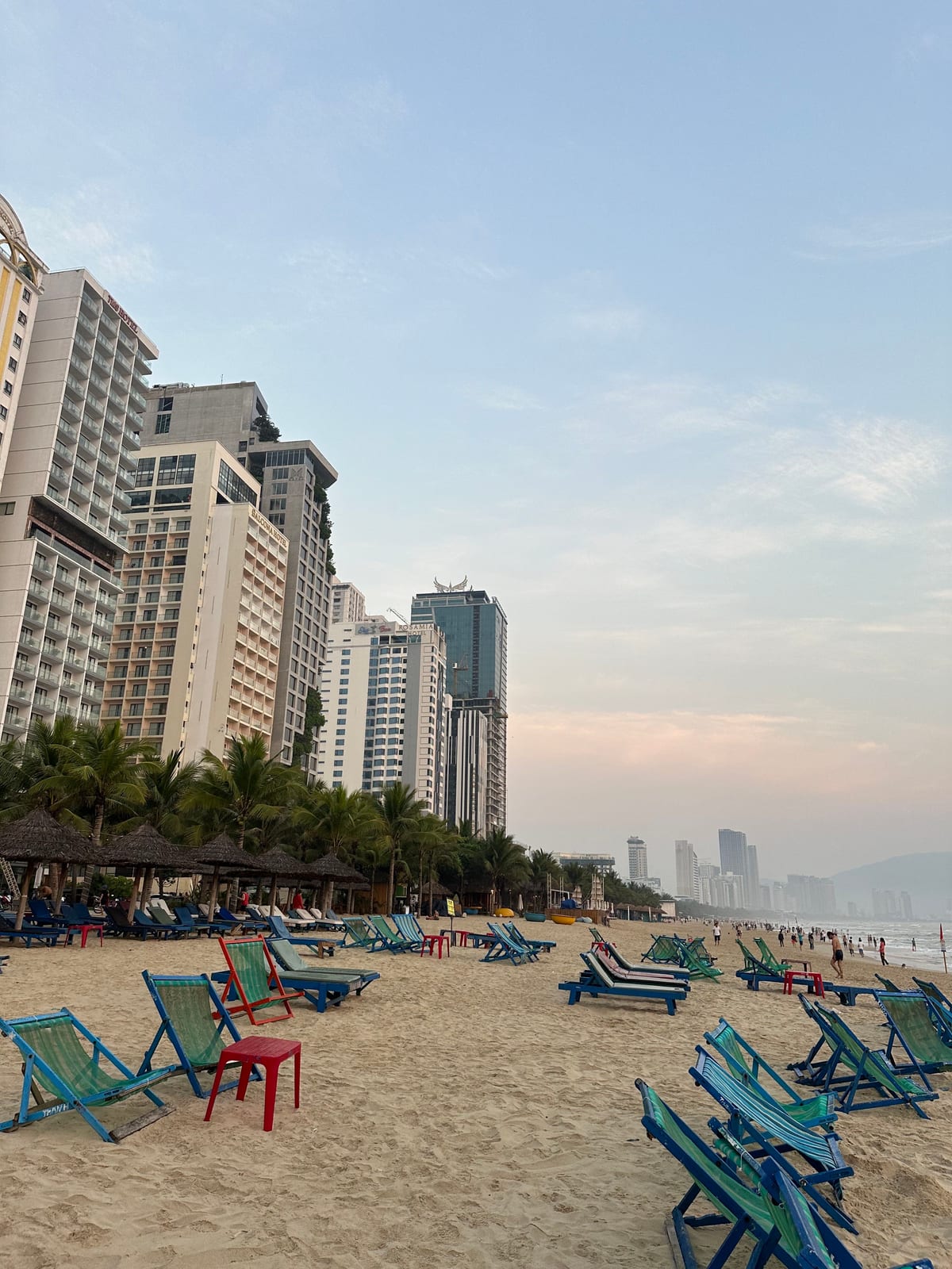 Hotels and sun loungers along My Khe beach in Da Nang, Vietnam