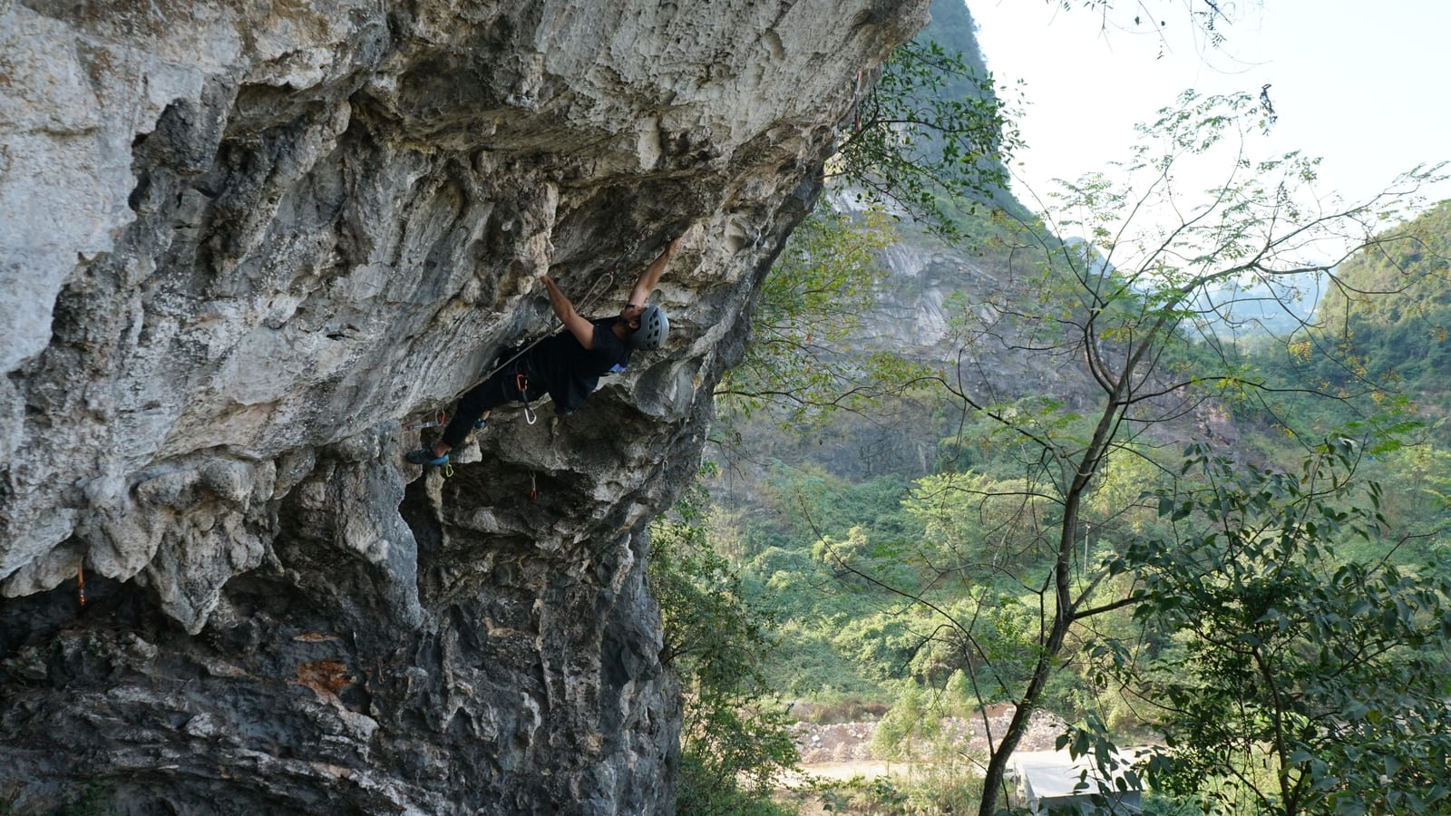 Roof climbing under the main overhang at Boxing Ring in the Sky, Yangshuo, China