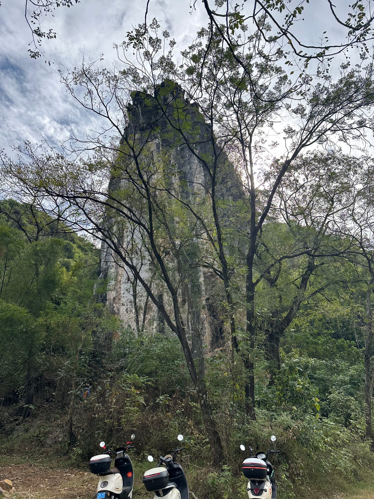 Karst tower of Spearhead crag seen from the parking area, Yangshuo