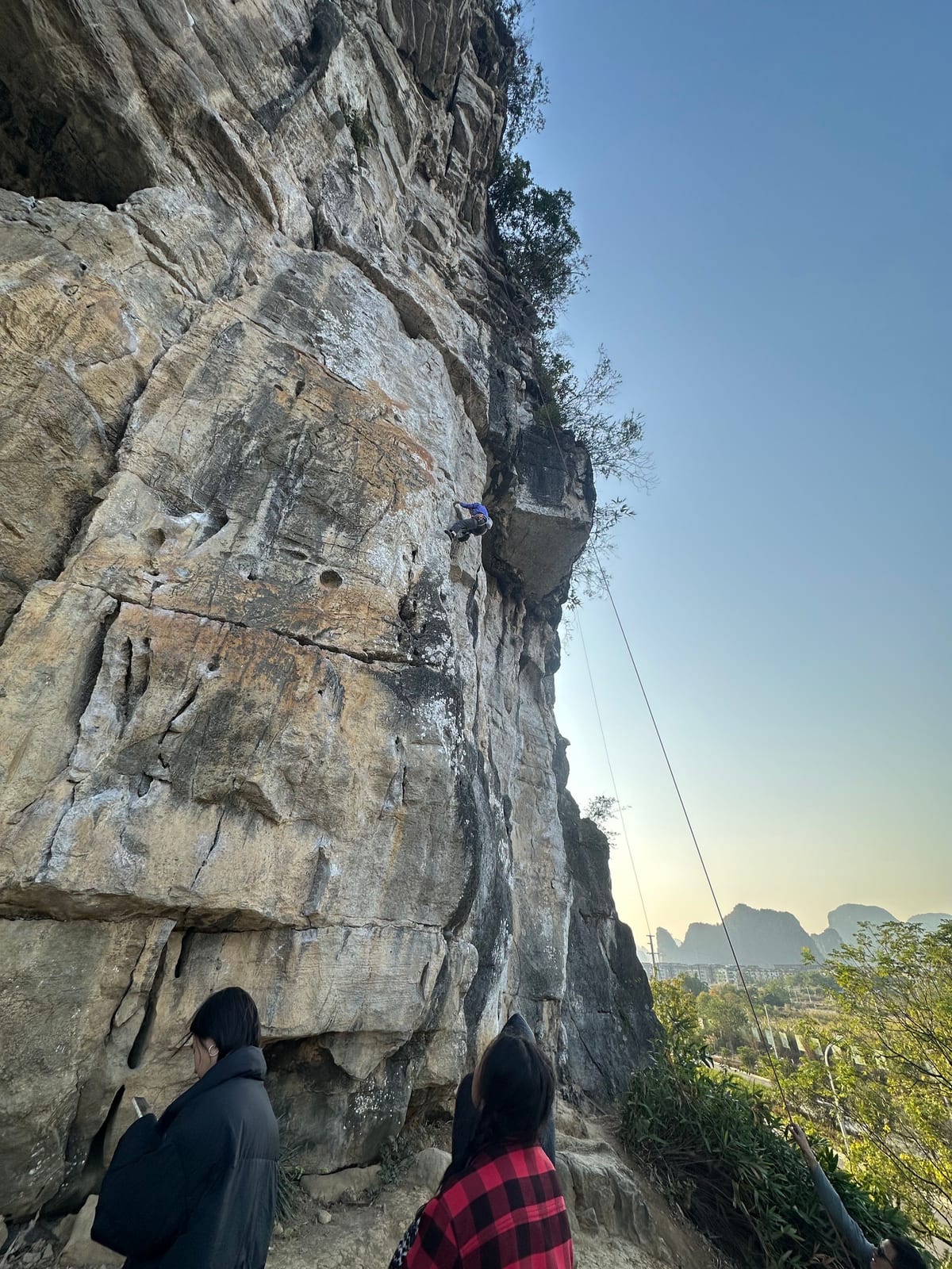 The base of The Egg crag with belay area, Yangshuo