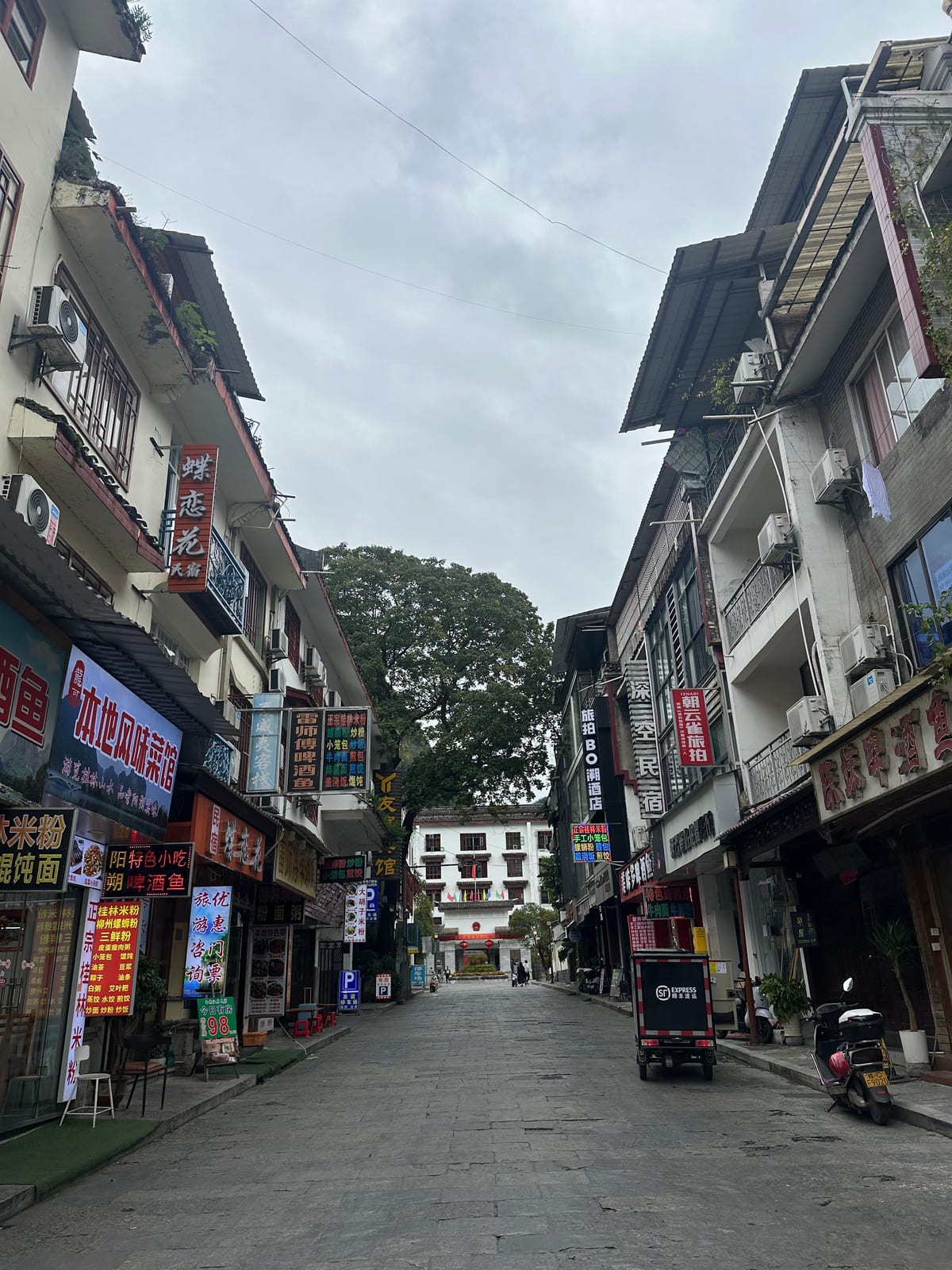 A quiet Yangshuo street in the morning before the shops open