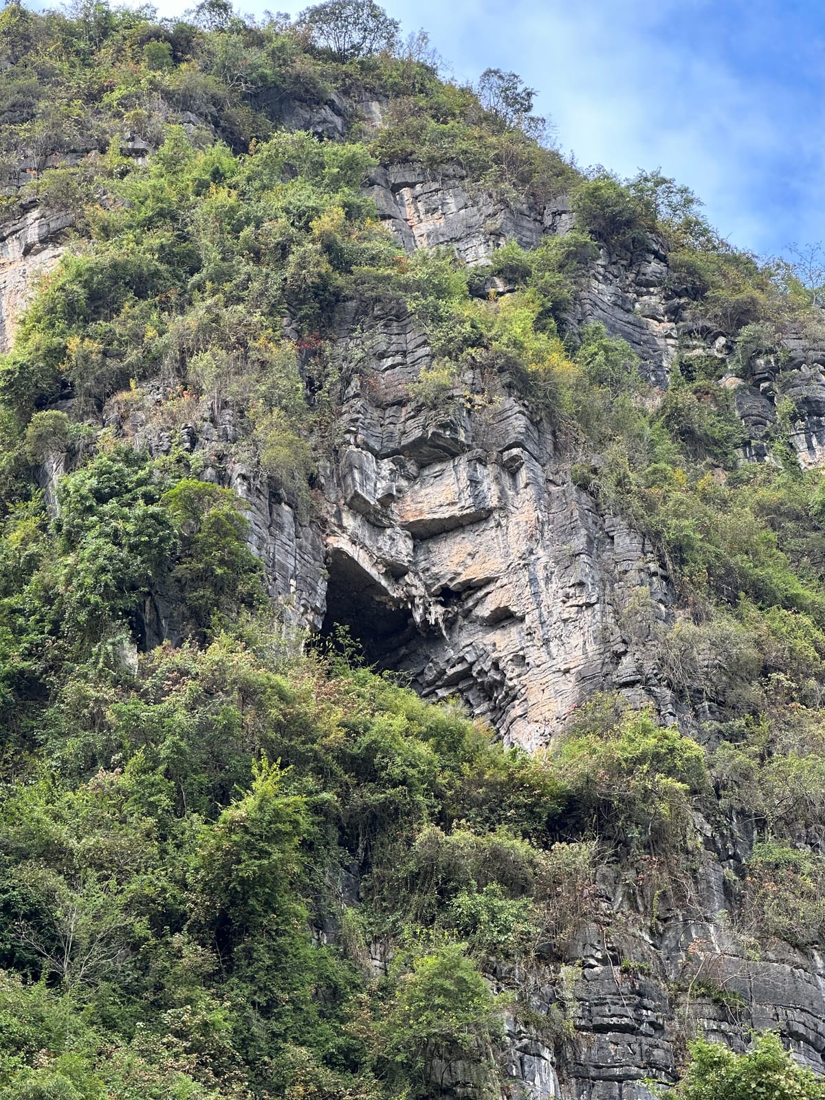 Treasure Cave crag in the karst hills near Yangshuo, China