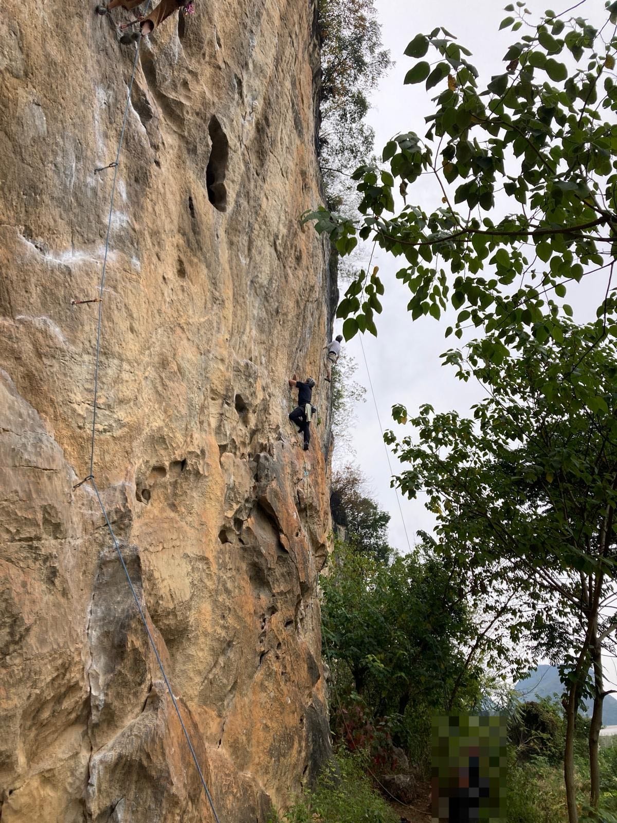 The corridor of orange and grey limestone at White Mountain crag, Yangshuo